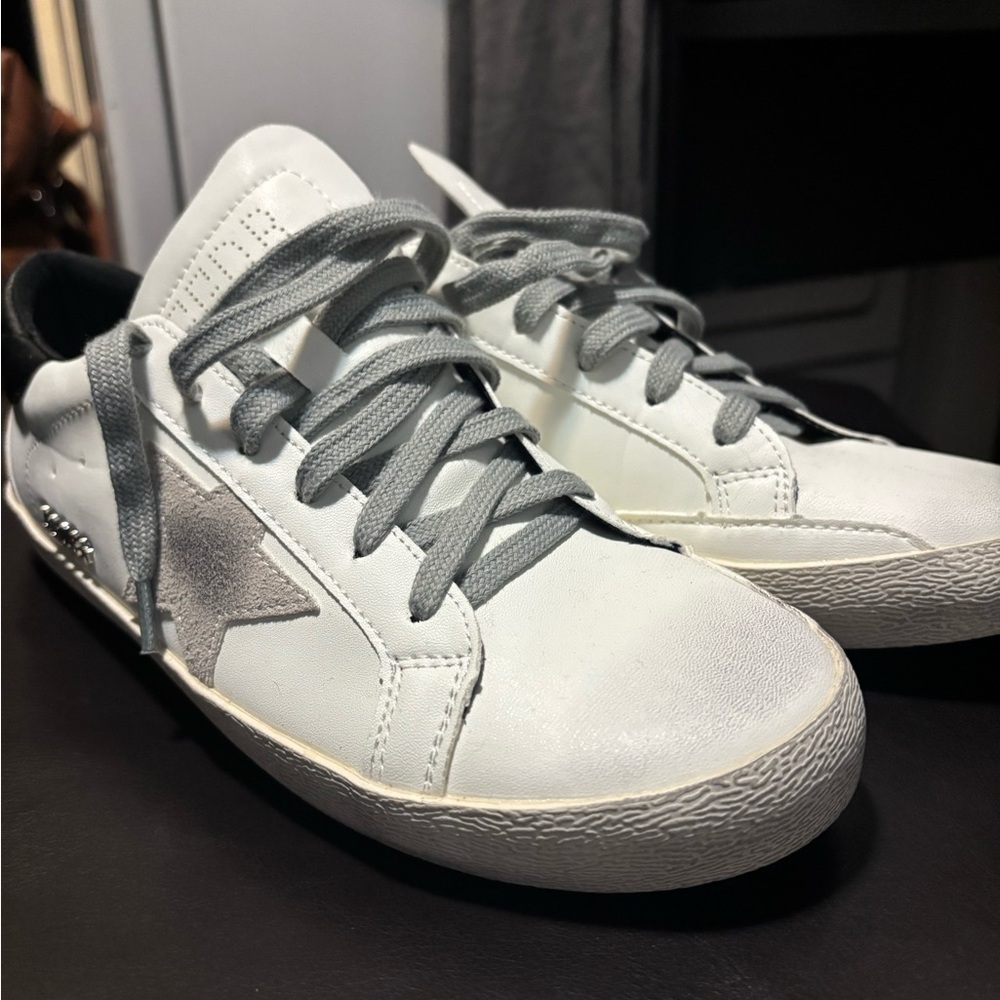 Golden Goose Black and White Superstar Sneakers